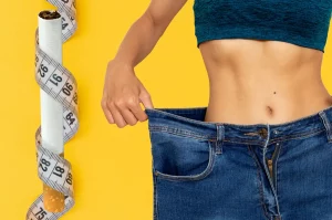 Cigarety a chudnutie - ilustračný obrázok: telo štíhlej ženy v nohaviciach väčšej veľkosti a cigareta obmotaná metrom